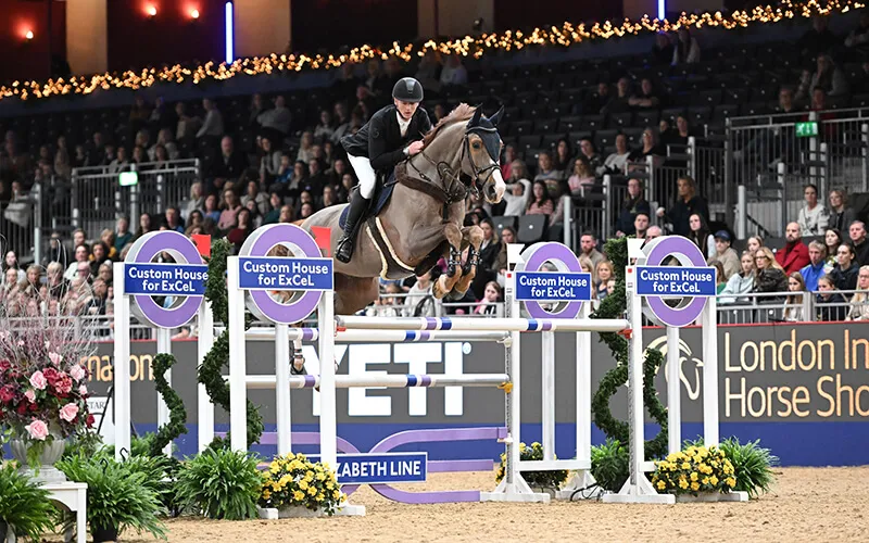 Alexander McLean riding Gino F winner of The Yeti Under 25 British Show Jumping Championship at The London International Horse Show at ExCel in London on the 12 December 2023