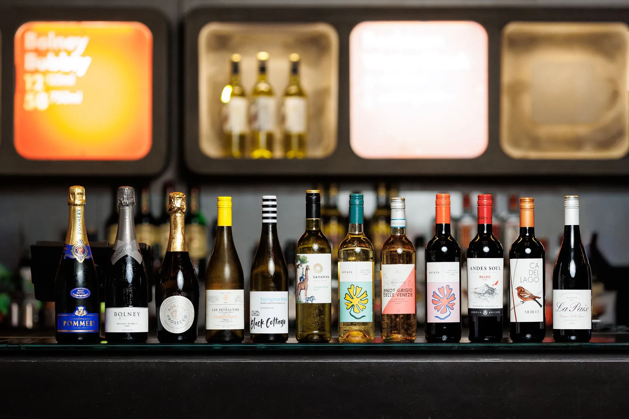 Jascots Wine, row of wine bottles