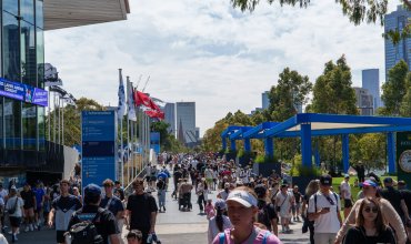 Melbourne, VIC, Australia. January 14, 2026. - Thousands of tennis fans are seen walking towards the Rod Laver Arena at the Australian Open in Melbourne.