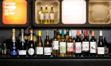 Jascots Wine, row of wine bottles
